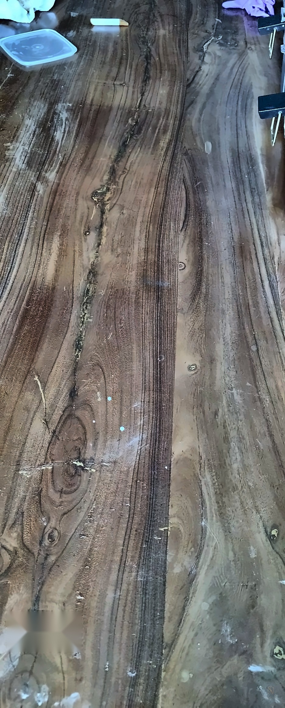 Live-edge wood table after crack repair